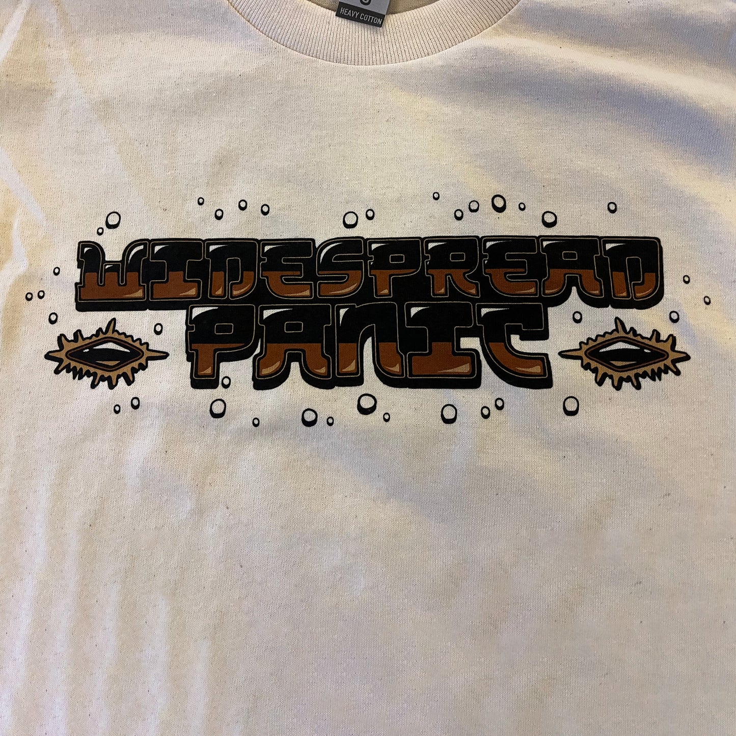 The front of the St. Louis event tee with detail