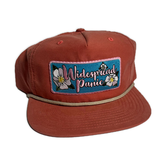 The front of the Widespread Panic Flower Patch Rope Hat